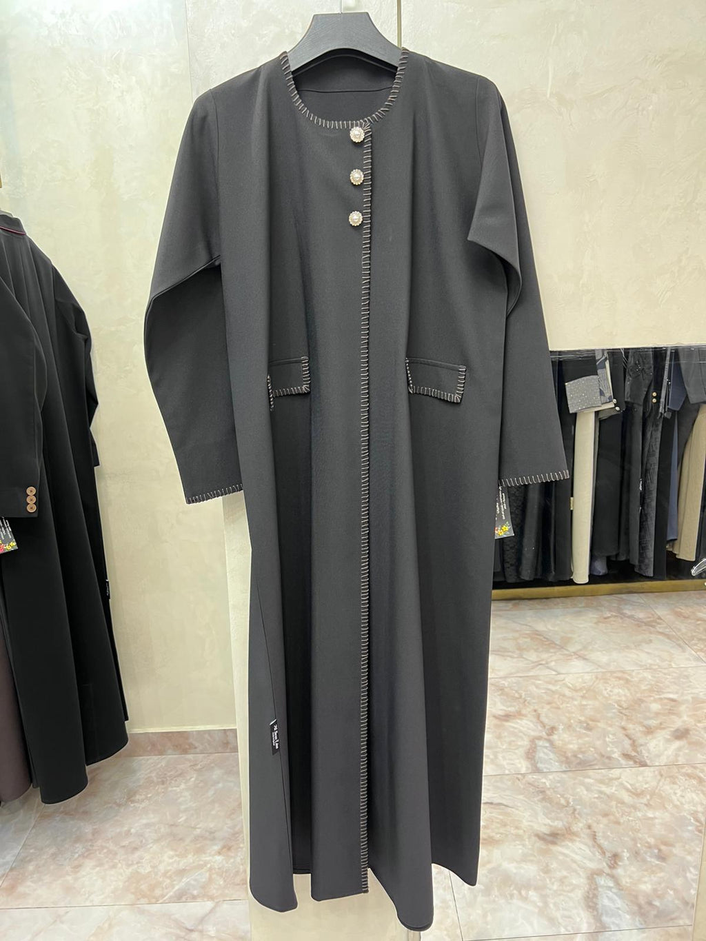 Premium Charcoal Grey Abaya with Contrast Stitch Detailing & Gold Button Accents – Qatar Collection