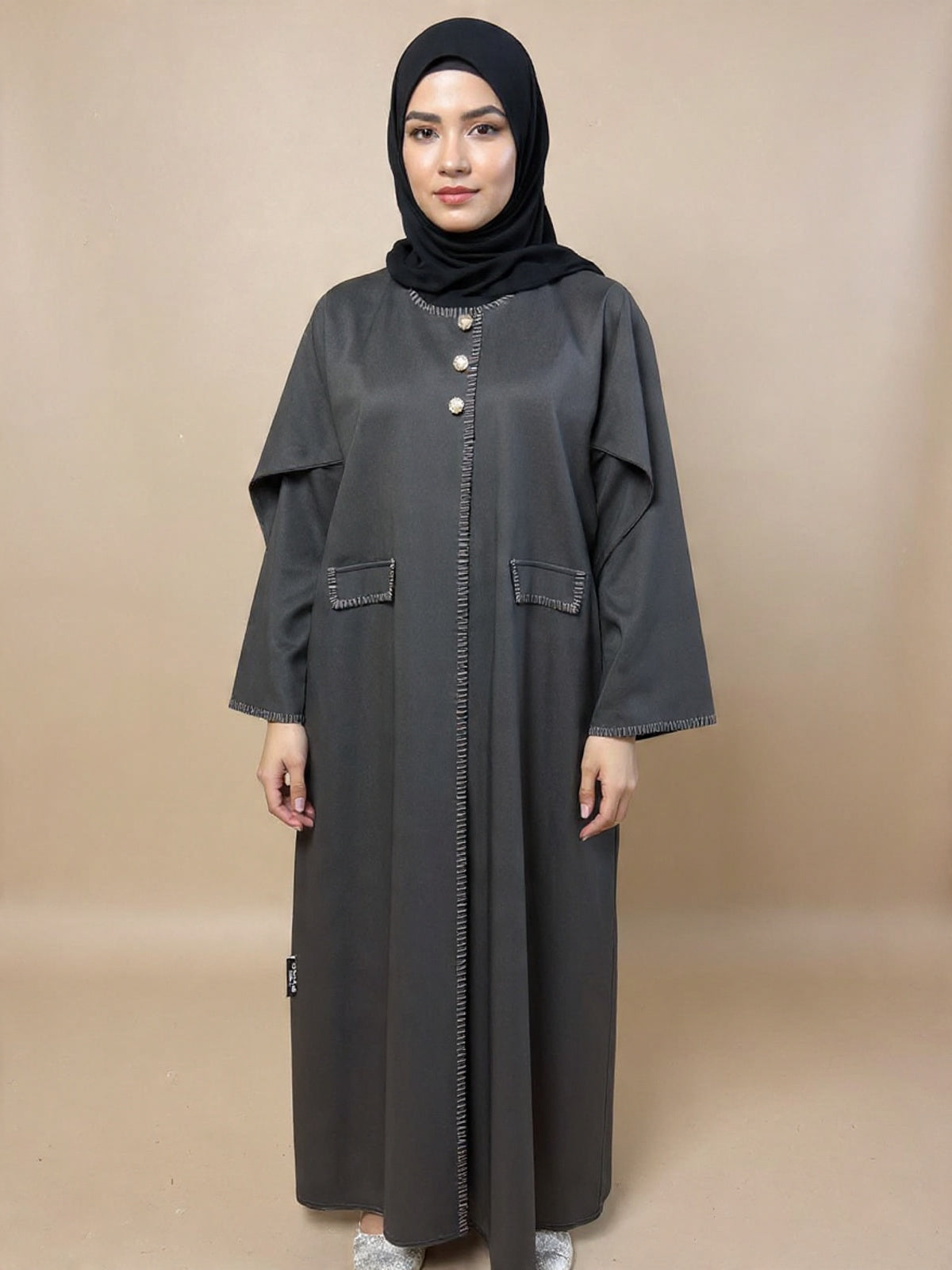 Premium Charcoal Grey Abaya with Contrast Stitch Detailing & Gold Button Accents – Qatar Collection