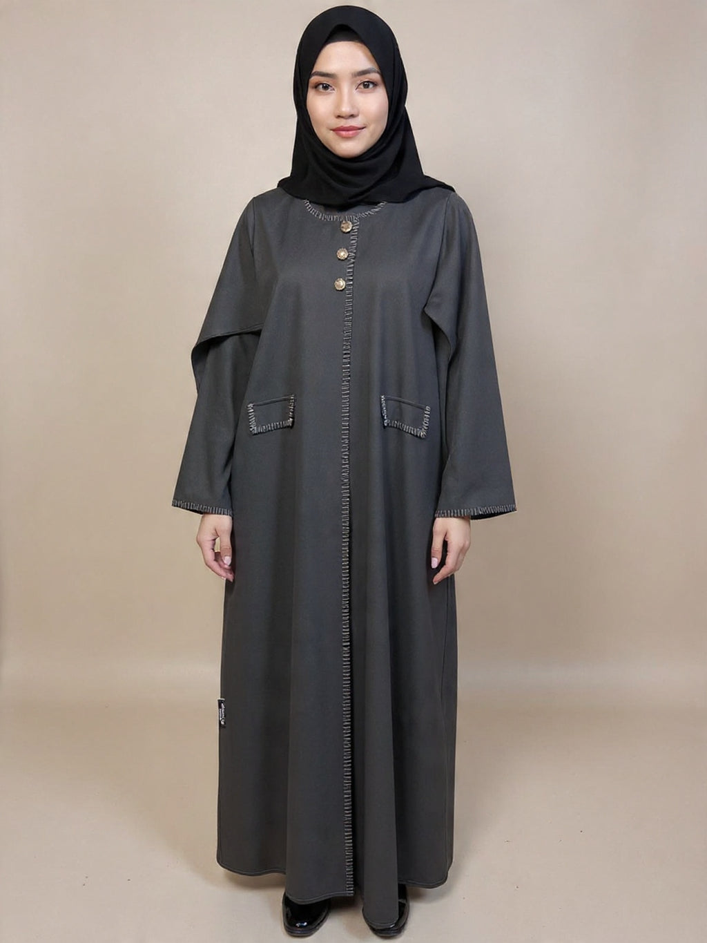 Premium Charcoal Grey Abaya with Contrast Stitch Detailing & Gold Button Accents – Qatar Collection