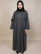Premium Charcoal Grey Abaya with Contrast Stitch Detailing & Gold Button Accents – Qatar Collection